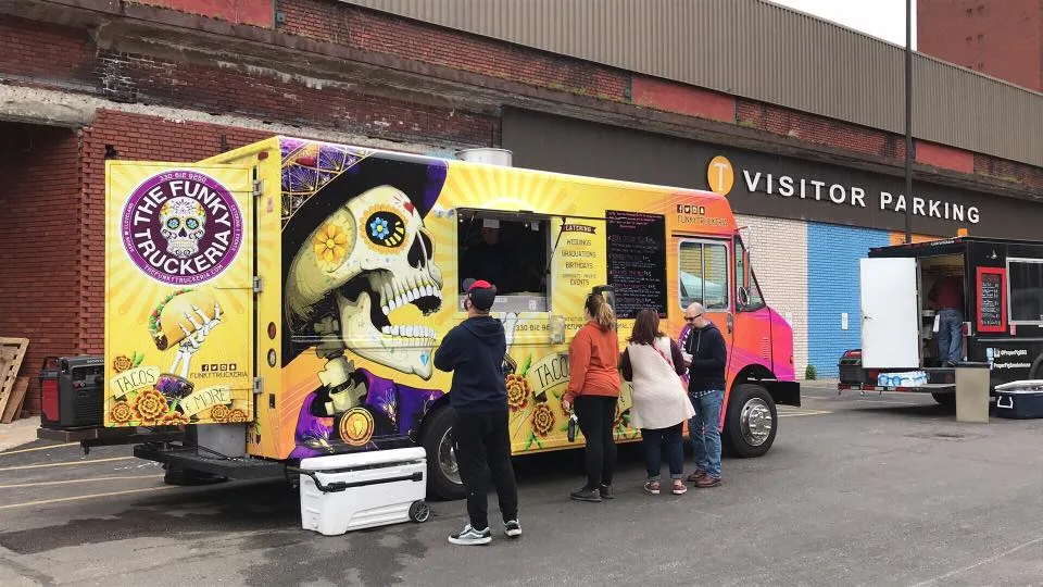 The Funky Truckeria food truck serving guests at an event